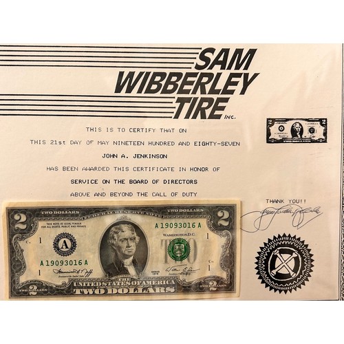 298 - A Sam Wibberley Tire Inc., two dollar bill award, framed