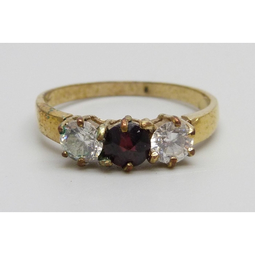 1000 - A silver gilt, garnet and zircon ring, R