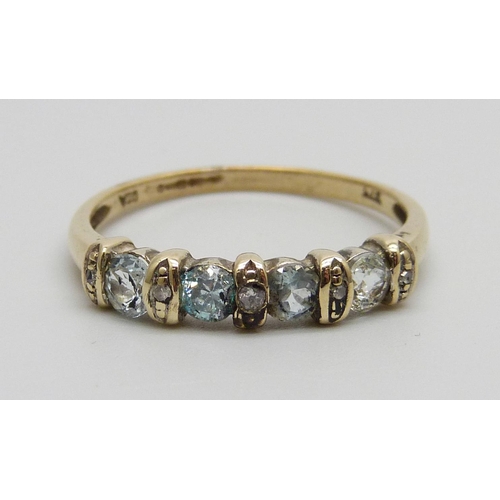 1001 - A 9ct gold, aquamarine and diamond ring, 2g, S/T