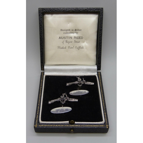 1006 - A pair of hallmarked silver Flintlock Pistol cufflinks, for Austin Reed of Regent Street, London 196... 