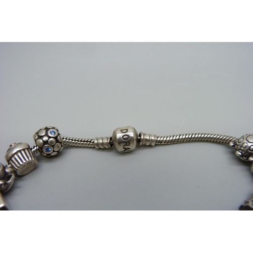 1018 - A silver Pandora bracelet with fourteen charms