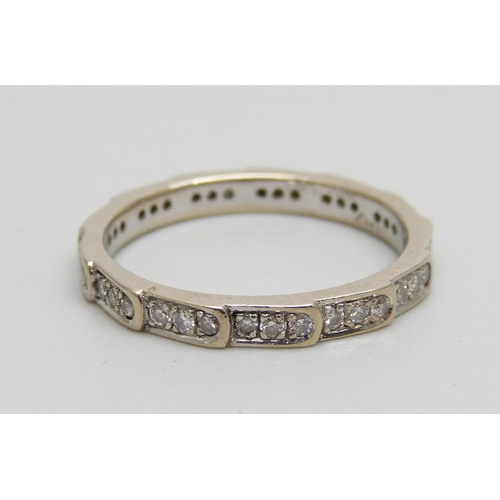 1045 - An 18ct white gold and 39 stone diamond eternity ring, 2.9g, O, in a vintage ring box