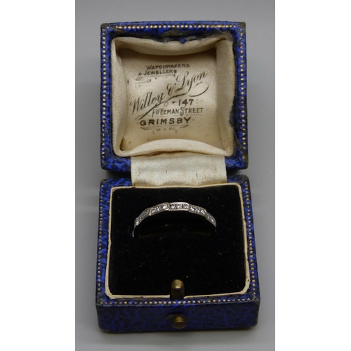 1045 - An 18ct white gold and 39 stone diamond eternity ring, 2.9g, O, in a vintage ring box