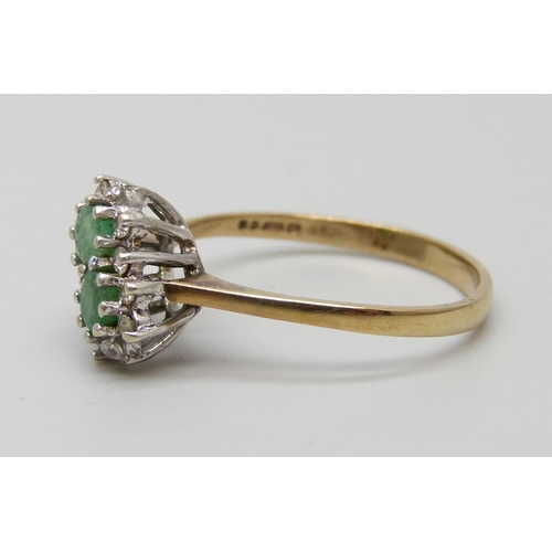 1048 - A 9ct gold, emerald and diamond cluster ring, 1.7g, N/O