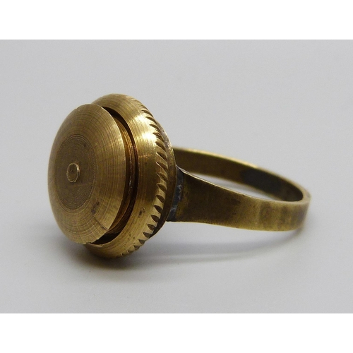 1049 - A brass poison ring with screw off top, possibly WWII period military related