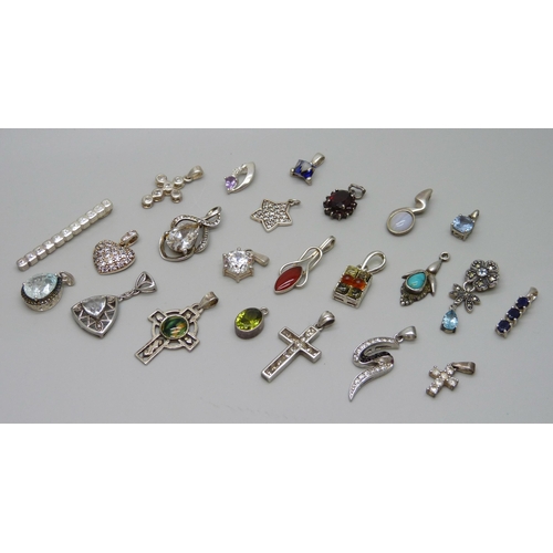 1052 - A collection of gem set silver pendants