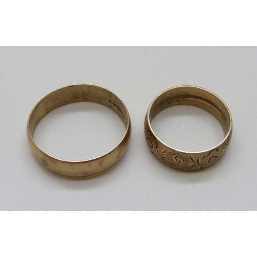 1064 - Two 9ct gold rings, 7.3g, N and U