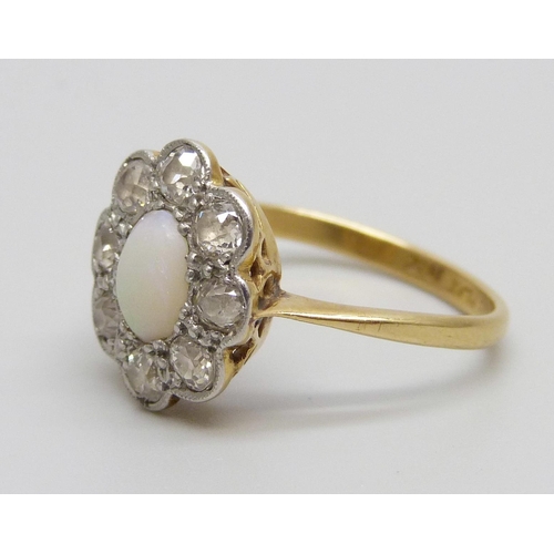 1068 - An 18ct gold and platinum set diamond and opal cluster ring, 3.1g, N, (ring top 11mm x 13mm)