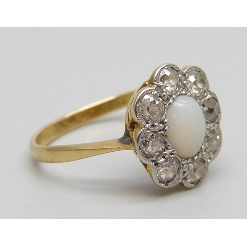 1068 - An 18ct gold and platinum set diamond and opal cluster ring, 3.1g, N, (ring top 11mm x 13mm)