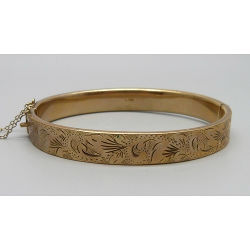 1074 - A 9ct gold bangle, 12.2g