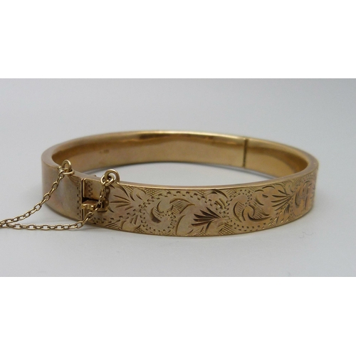 1074 - A 9ct gold bangle, 12.2g