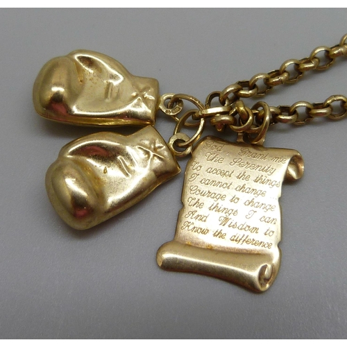 1076 - A 9ct gold chain, a 9ct gold boxing gloves charm and one other 9ct gold charm, 7.2g, chain 62cm