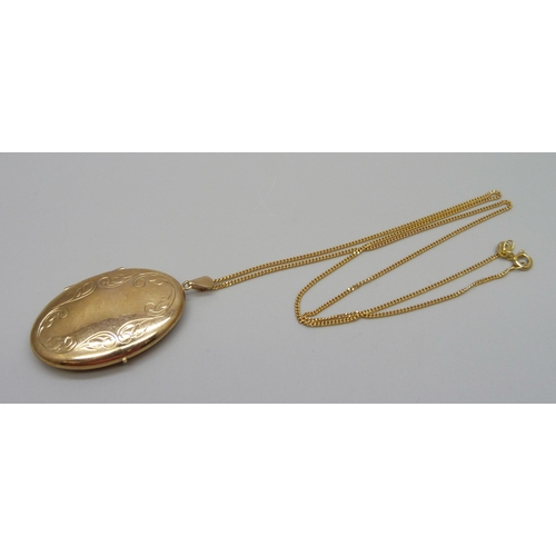 1078 - A 9ct gold locket and chain, 8g, locket 24mm wide