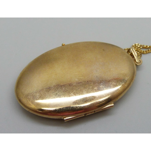 1078 - A 9ct gold locket and chain, 8g, locket 24mm wide