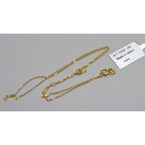 1101 - A fine 9ct gold neck chain, 0.6g, 41cm