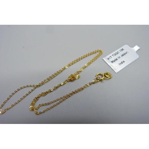 1101 - A fine 9ct gold neck chain, 0.6g, 41cm