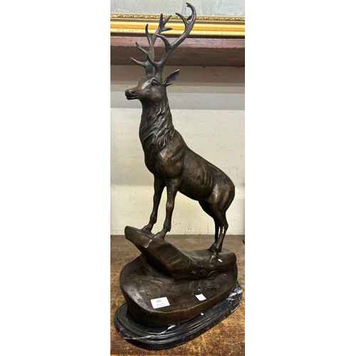 335 - A large French style bronze figure of a stag, on black marble socle