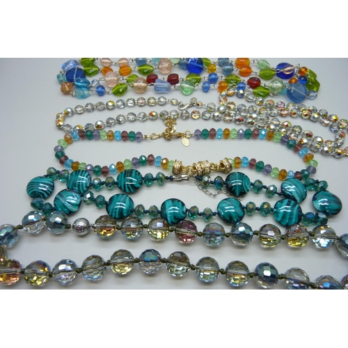 1107 - A string of glass beads by Joan Rivers and other glass bead necklets