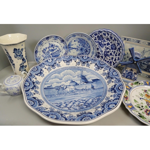 1121 - A collection of Delft pottery including a large charger **PLEASE NOTE THIS LOT IS NOT ELIGIBLE FOR I... 