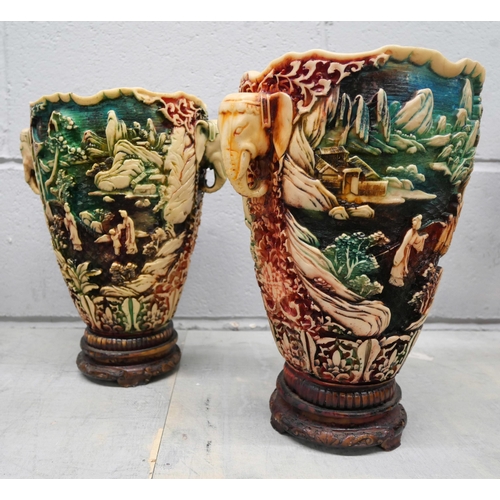 1140 - A pair of oriental style resin vases **PLEASE NOTE THIS LOT IS NOT ELIGIBLE FOR IN-HOUSE POSTING AND... 