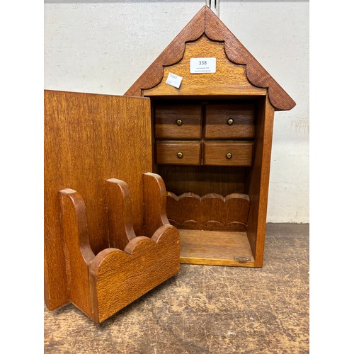 338 - An oak house shaped smokers cabinet