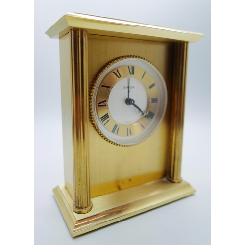 622 - A Swiza 8-Days brass mantel timepiece