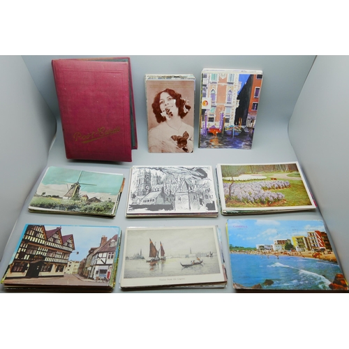 632 - Postcards; a box of postcards and album, vintage to modern