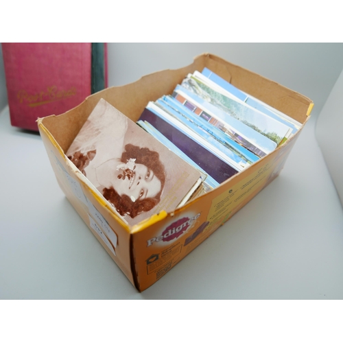 632 - Postcards; a box of postcards and album, vintage to modern