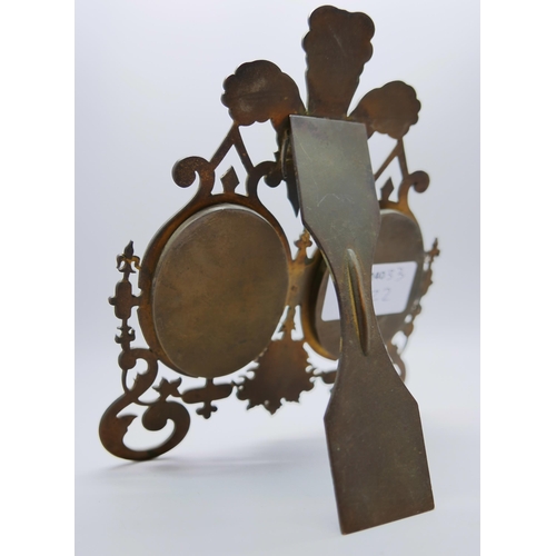 635 - A brass twin picture frame, decorated with Prince of Wales feathers