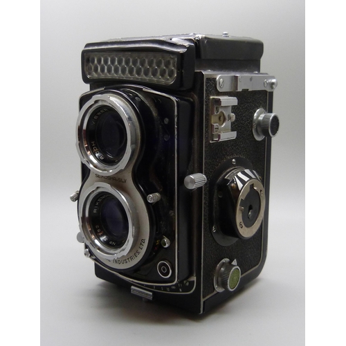 654 - A Seikosha SLV TLR camera with Ricoh and Rikenon lenses