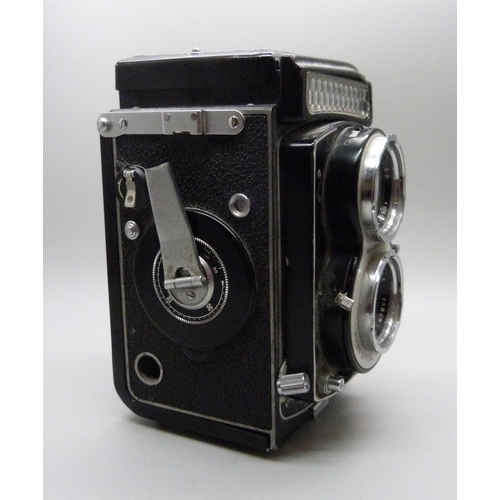 654 - A Seikosha SLV TLR camera with Ricoh and Rikenon lenses