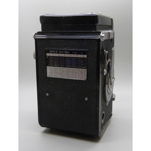 654 - A Seikosha SLV TLR camera with Ricoh and Rikenon lenses