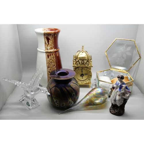 659 - A collection of glass and other items including a Poole vase, iridescent glass, a clock, glass bird ... 