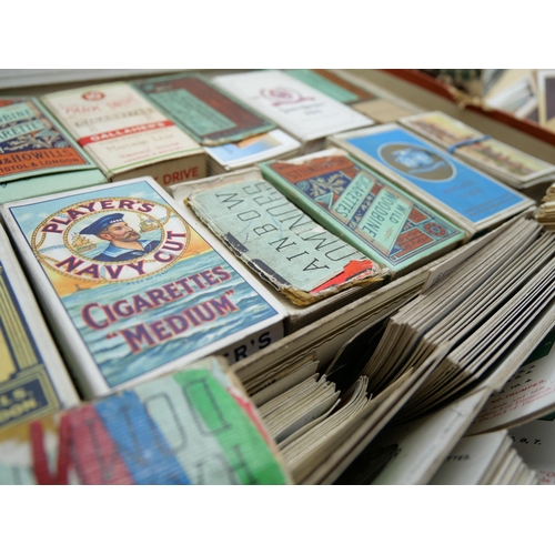 661 - A box of cigarette cards and some tea cards