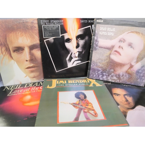 670 - A collection of LP records, David Bowie, Neil Diamond and Jimi Hendrix