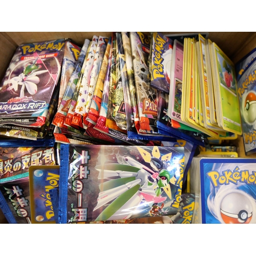 673 - A box of Pokémon cards, English, Japanese, Chinese and base cards