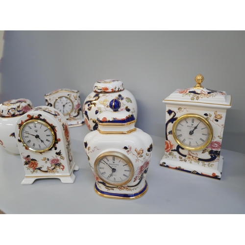 682 - A collection of Mason's Mandalay; four clocks and two ginger jars