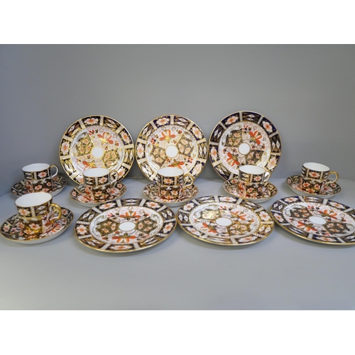 703 - A Royal Crown Derby 2451 pattern six setting coffee set; six cans, saucers and tea plates