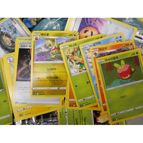 717 - A box of Pokémon cards, English, Japanese, Chinese and base cards