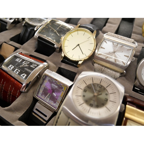 720 - An aluminium watch case containing fourteen wristwatches, Diesel x3, Police, French Connection and v... 