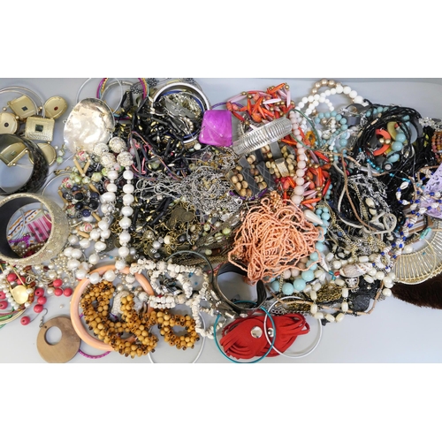 729 - Three bags of costume jewellery