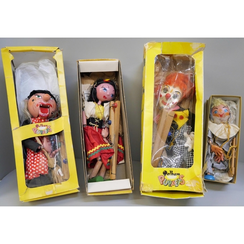 739 - Four Pelham puppets; Bimbo SL17 the Clown, SM2 Witch, Andy Pandy and a girl, all boxed