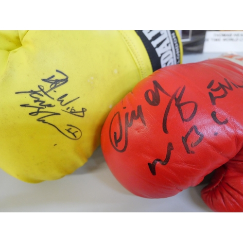 747 - Boxing; two signed boxing gloves, Frank Bruno and Nigel Benn and two signed pictures, Thomas Hearns ... 