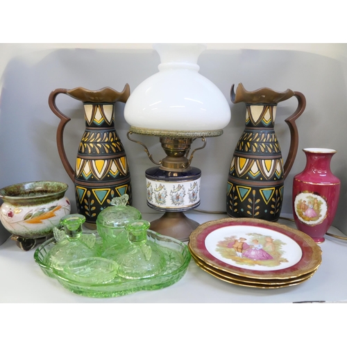 772 - A Limoges vase and three plates, two Falcon ware Luxor jugs, a green glass dressing table set, an It... 