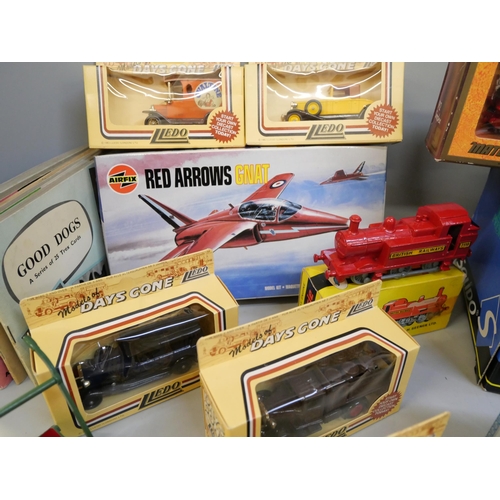 780 - A collection of toys, die-cast models including a Dinky lawn mower, Corgi Carrosse Royal, cigarette ... 