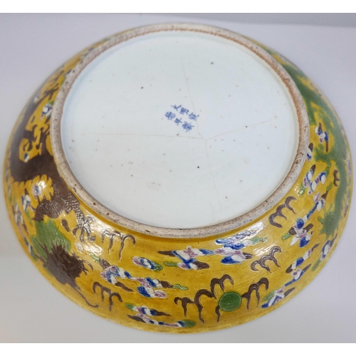 798 - A late 19th Century Chinese yellow ground dish, six character mark, a/f, 33cm