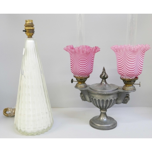 800 - A pewter twin oil lamp with pink glass shades, one shade a/f and a mid 20th century glass table lamp... 