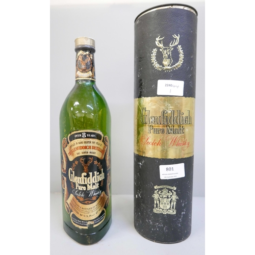 801 - A one litre bottle of vintage Glenfiddich pure malt scotch whisky with tin