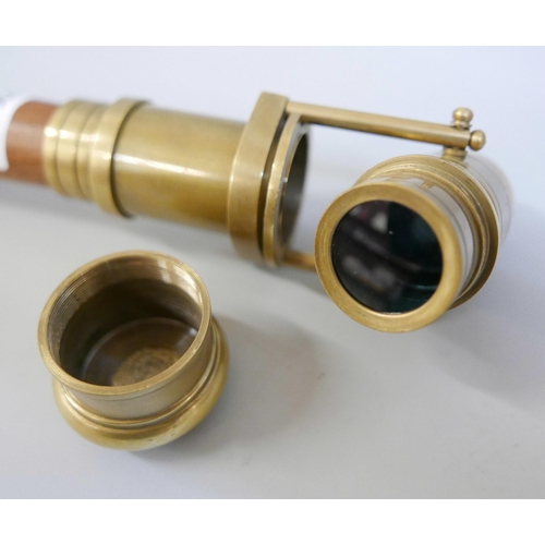 806 - A walking cane with built in concealed brass spyglass/retractable telescope