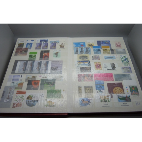 830 - Stamps; a stockbook of Iceland stamps mainly from 1990s and 2000s but some earlier, (the mint stamps... 